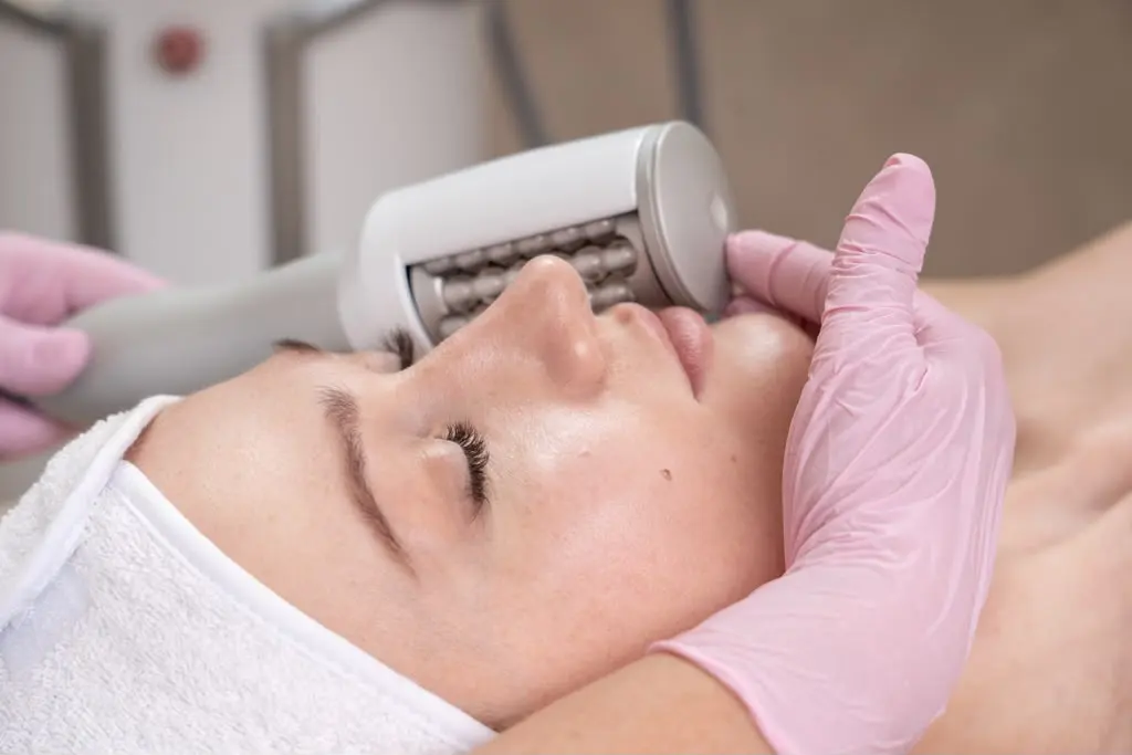 The smaller facial handpiece worked along the cheekbone